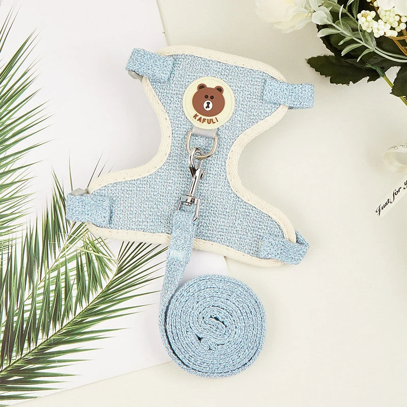Light blue padded rabbit harness and matching leash set with a round wooden tag