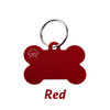 A red bone-shaped dog ID tag with a metal keyring.