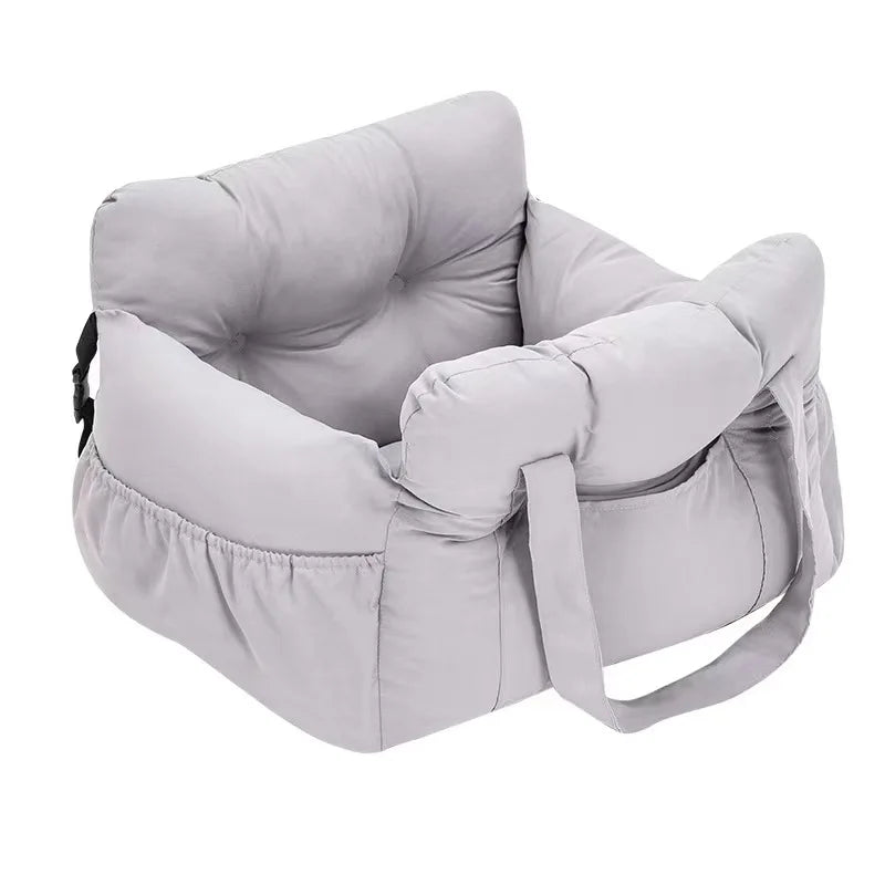 A light gray durable pet car seat with safety straps shown from the side.