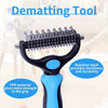 A black and blue pet deshedding tool with a stainless steel brush for grooming.