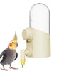 Beiger wiederverwendbarer Vogelfutterspender mit klarem Kuppel und gelber Papagei-Figur.