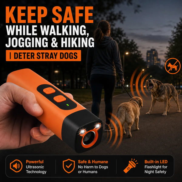 An orange ultrasonic dog repeller device is held in a hand, demonstrating its use for deterring stray dogs while walking.
