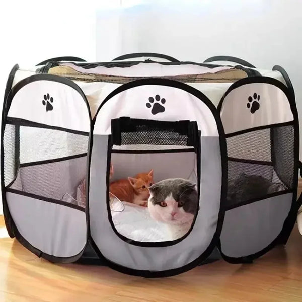 A portable foldable pet playpen with a mesh enclosure and black frame, featuring paw print designs.