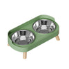 A light green pet feeding dish with two stainless steel bowls for dogs and cats.