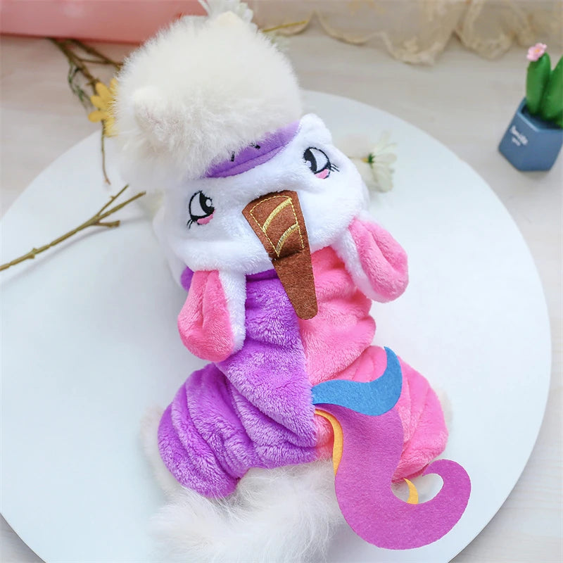 A plush fleece pet outfit featuring purple and pink colors with a white fluffy hood for dogs and cats.
