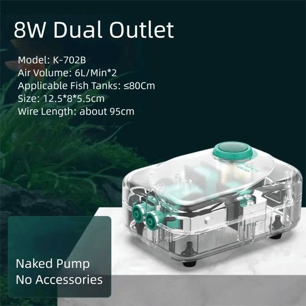 Clear plastic 8W dual outlet aquarium air pump with a green component resting on a white surface.