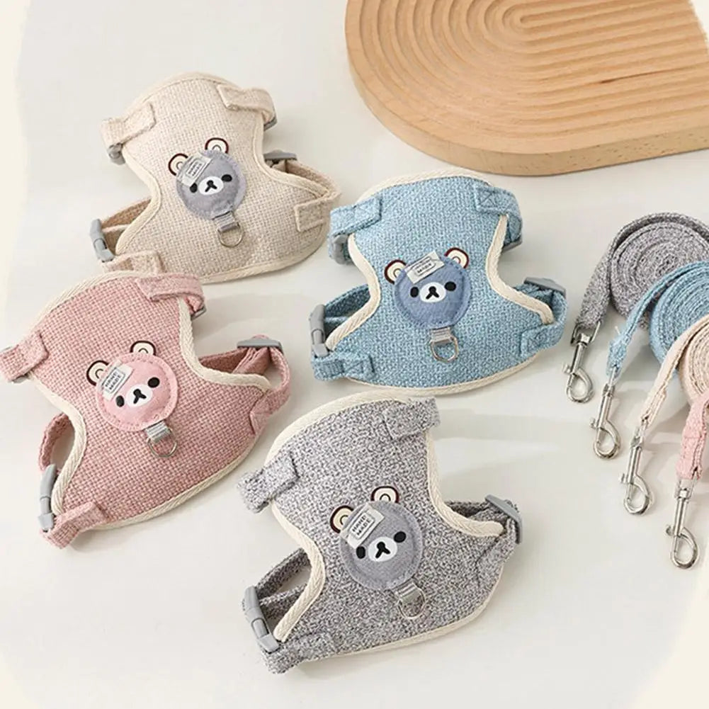 A collection of light-colored pet leash harnesses for dogs and cats featuring cute bear designs in various pastel shades.