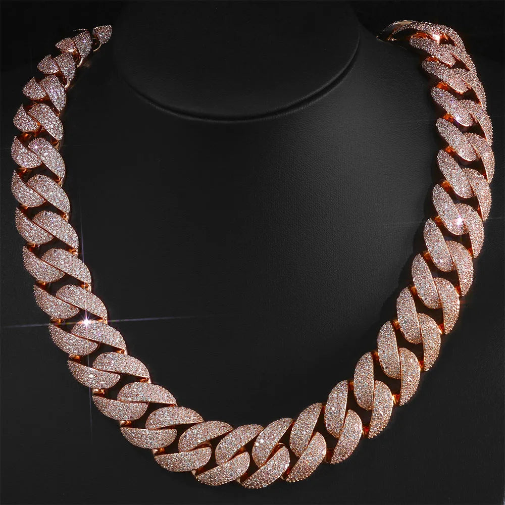 Rose gold plated curved flip buckle Cuban link necklace displayed on a black display stand.