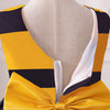 Vue arrière d'une robe rayée jaune et noir avec un nœud