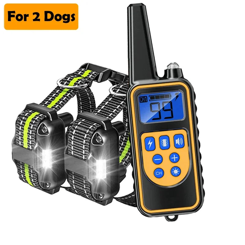 A black remote dog training collar with an LCD display and buttons, shown next to a leash.