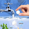 A hand is pouring water from a faucet into an aquarium, demonstrating that no water change is required for the purification t