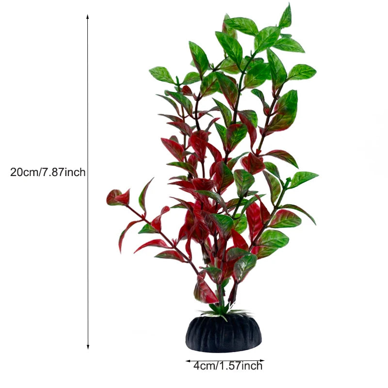 Une plante aquatique artificielle vibrante avec des feuilles rouge foncé dans un pot noir.
