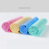 Four kinds of color ultra-absorbent dog bath towels rolled and displayed side by side