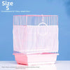 Pink bird cage with vertical bars and a pink base shown against a blue background.