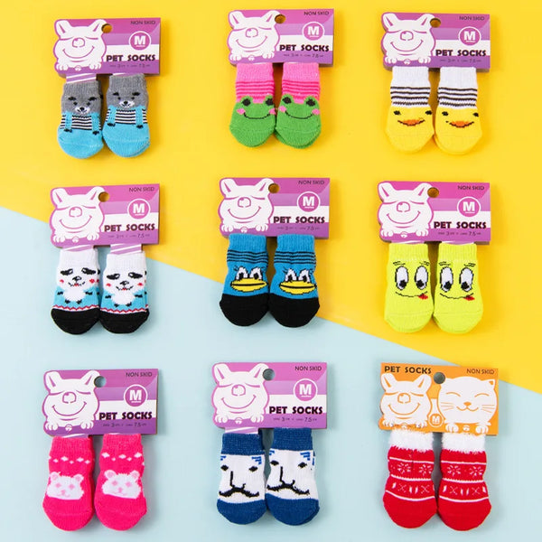 Assortment of cute pet dog and cat shoes in various colors and patterns for pets