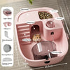 A pink luxury hamster habitat cage showing various accessories like a play runway, hiding house, feeding area, and water feed