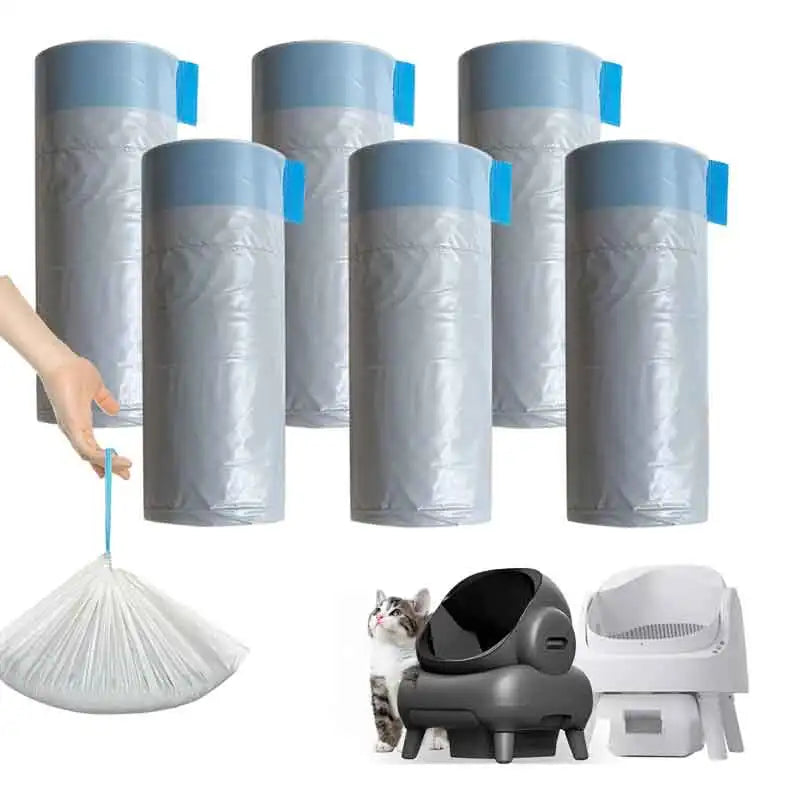 A collection of gray cat litter box liners with drawstring closures and a white litter box.
