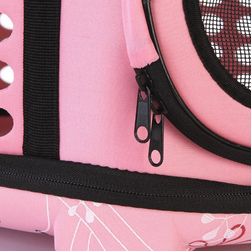 Pink breathable pet carrier backpack with black trim and mesh window