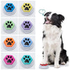 A set of colorful recordable talking buttons with paw print designs for dog training.