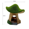 A miniature resin aquarium house decor featuring a green tree-like hiding shelter for shrimp and small fish.