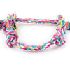 A colorful braided cotton rope dog chew toy for teeth cleaning