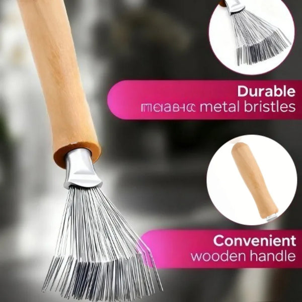 A natural wooden hairbrush cleaner with a wooden handle and metal bristles shown in detail.