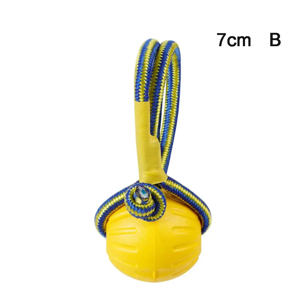 Yellow rubber fetch ball for dogs with blue braided rope and yellow handle