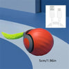 A red spherical interactive cat sounding toy with a green catnip element and a white USB connector shown next to it.
