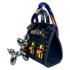 Black mini house-shaped bag with a puppy keychain charm and colorful braided cord