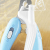 A close-up of a light blue pet nail clipper and its accessory, showing the clippers and a clear plastic tool against a sandy 