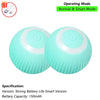A pair of light blue spherical cat toys with a switch and battery compartment, labeled for Normal & Smart Operating Mode.