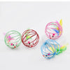 Colorful interactive cat toy featuring a rolling mouse with vibrant pink, green, and blue yarn and a sand chamber.