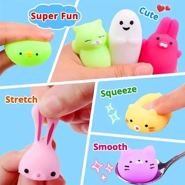 A collection of colorful animal stress relief squeeze toys including a green duck, a lime green bunny, a pink rabbit, and a y