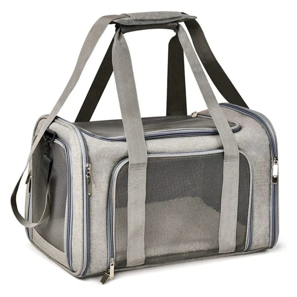 A gray breathable pet carrier backpack with padded straps and a mesh window for small dogs or cats.