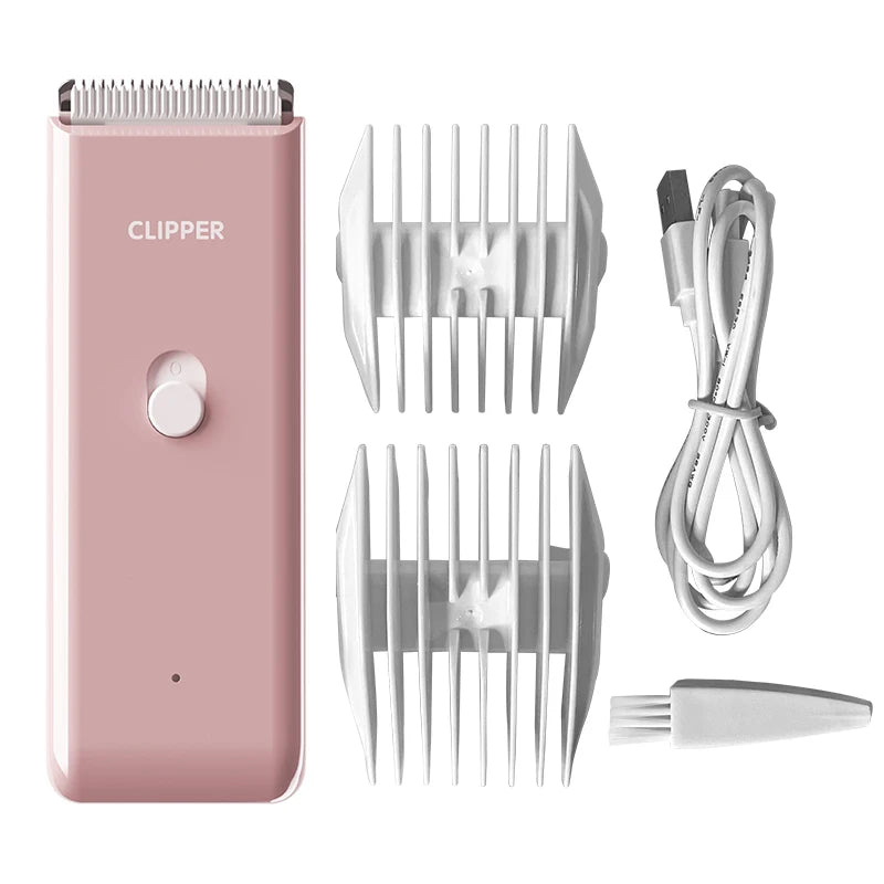 Pinkes kabelloses Tierpflege-Haarschneider mit mehreren Aufsätzen und Ladekabel.