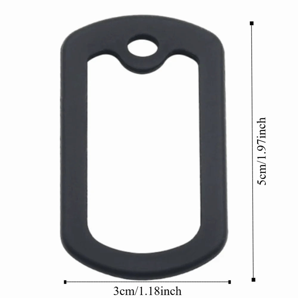 A black silicone dog tag protector muffler with a rectangular shape and oval opening.