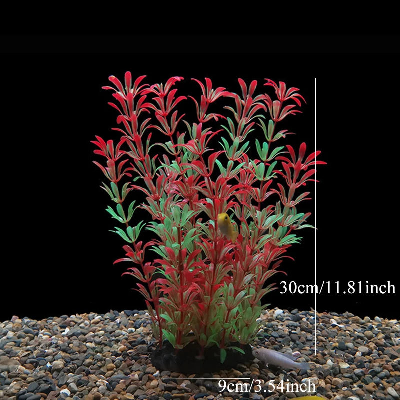 Un amas de plantes décoratives aquatiques artificielles réalistes aux feuillages rouges et verts plantées dans du gravier fon
