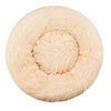 A round, light beige plush pet bed for dogs and cats.