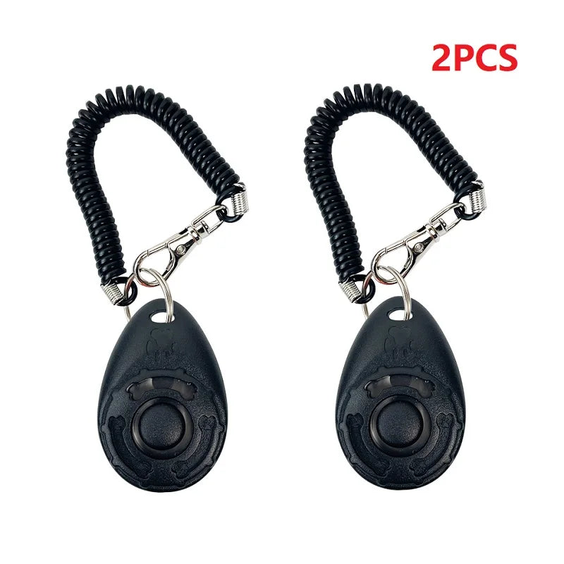 Zwei schwarze Hundetrainungs-Klicker-Armbänder mit Metallverschlüssen und ovalen Anhängern
