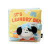 A yellow fabric toy with text on it, featuring a cute animal design.