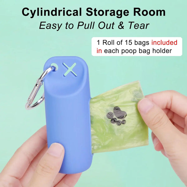 A hand holds a blue silicone cylindrical storage room for poop bags, showing the dispenser and a roll of bags.