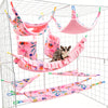 A multi-functional pet hammock and hideout set featuring pink fabric for a cat to play on inside a wire cage.