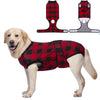 A golden retriever wearing a red and black plaid durable cotton recovery suit for dogs.