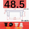 Black and white silicone rubber hole plugs with various sizes shown on a red surface