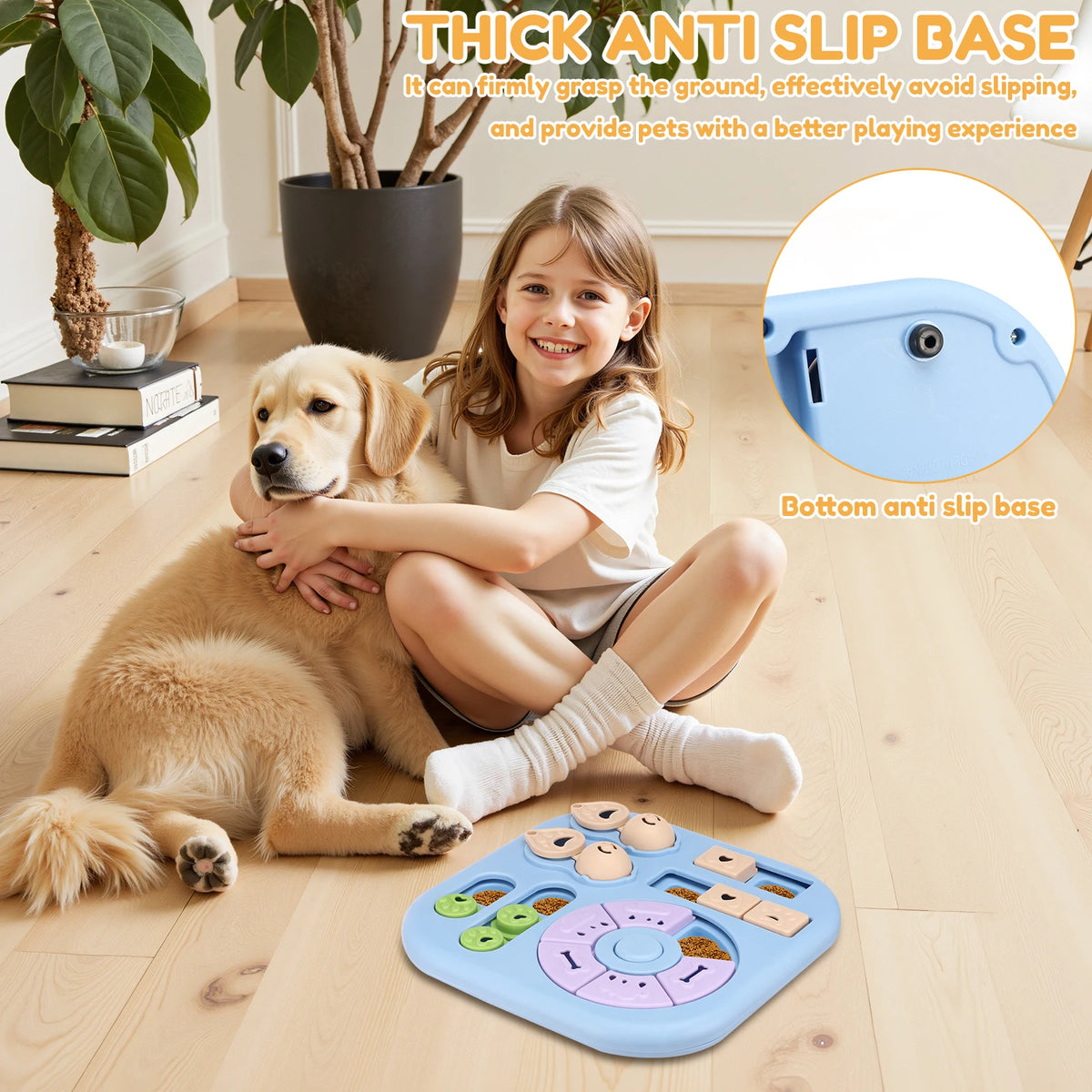 A young girl is interacting with a golden retriever dog and a blue puzzle toy with a non-slip base.