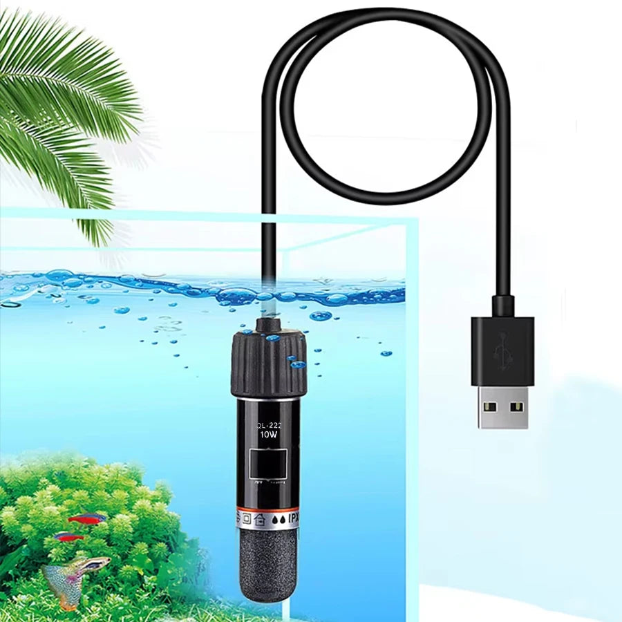 A black USB mini aquarium heater with a coiled wire is shown submerged in blue water near aquatic plants.