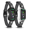 A pair of black and white adjustable dog bark collars with digital displays and vibration features.