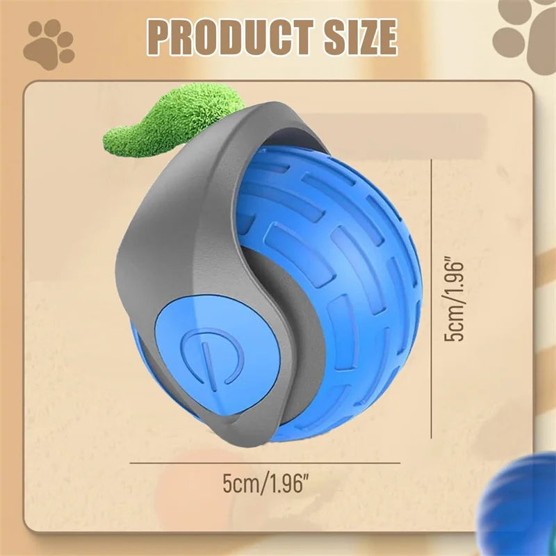 A blue and gray automatic electric cat ball toy is shown with a green ball on top, illustrating its size.