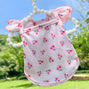 Pink summer dot pet dress for a small dog with white pearl trim