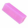 A pink silicone pet hair remover brush with small dots for grooming pets.